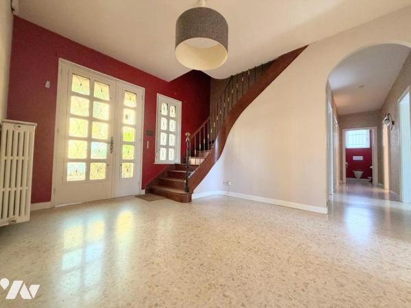Maison individuelle et terrain attenant