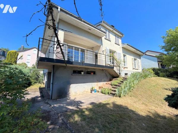 Maison individuelle et terrain attenant