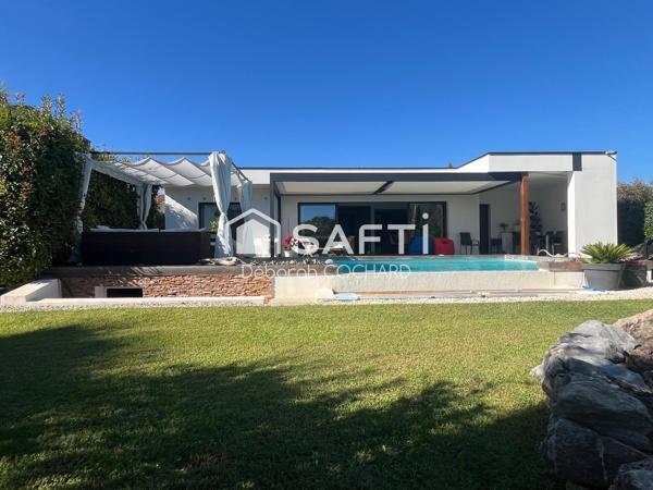 Maison contemporaine de plain-pied avec piscine à débordement – Produit exceptionnel