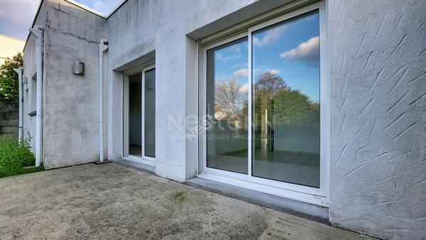 Nantes Boissière / Bout des pavés - Exclusivité ! En vente, maison d'architecte de 2005, plain pied 2 chambres, garage, jardin clos. A deux pas des petits commerces et du Tram.