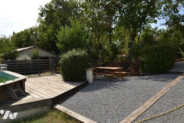 MAISON INDIVIDUELLE AVEC TERRAIN ATTENANT DE 2226 m²