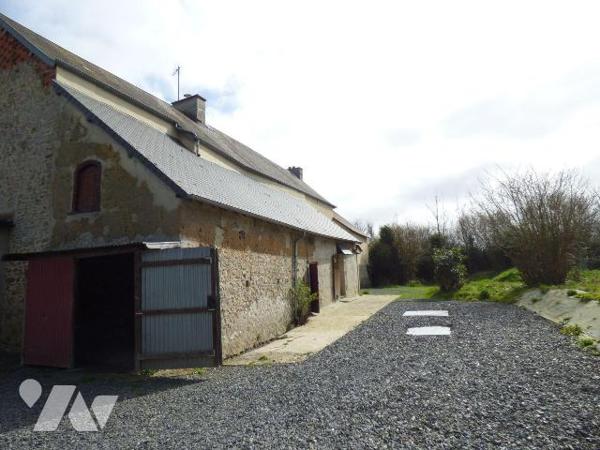 Maison d'habitation construite en pierre, masse et briques sous ardoises, comprenant :
Au rez-...