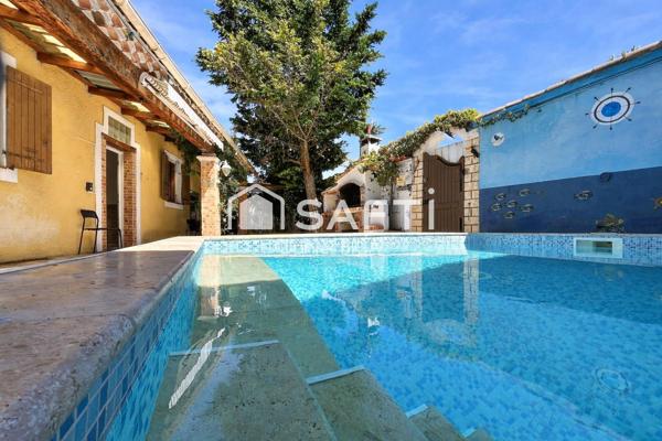 Maison de plain pied avec piscine et dépendance