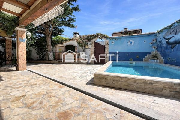 Maison de plain pied avec piscine et dépendance