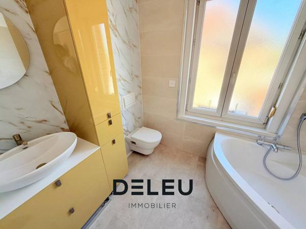 Maison semi plain-pied de 128 m² avec 4 chambres, jardin et garage à Wasquehal