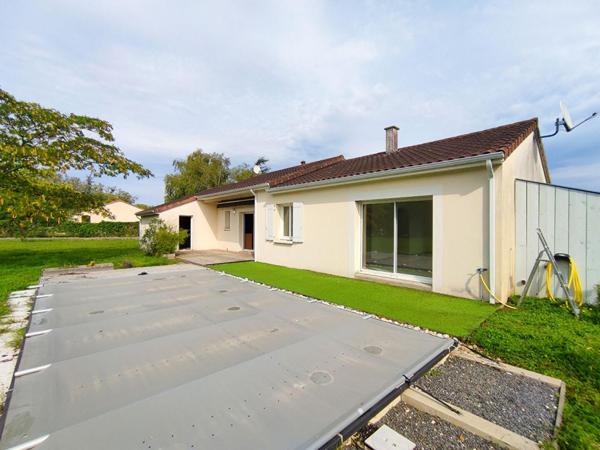 Maison de plain pied 5 pièces 111 m2 - garage et piscine