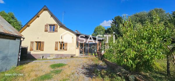 Maison 6 pièces avec 4 chambres, Véranda 30m2 et grande pièce de vie sur un terrain de 1177m2 avec dépendances.