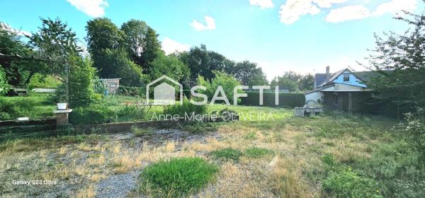Maison 6 pièces avec 4 chambres, Véranda 30m2 et grande pièce de vie sur un terrain de 1177m2 avec dépendances.