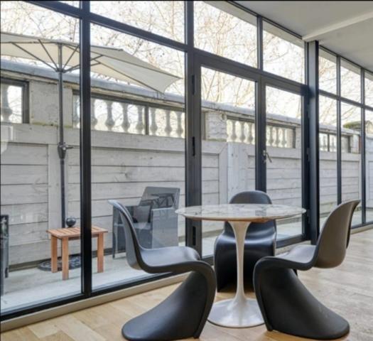 PARIS 17E – IMMEUBLE D’EXCEPTION AVEC JARDIN PRIVATIF, TERRASSES & ROOFTOP – 600 M² ENTIÈREMENT RÉNOVÉS