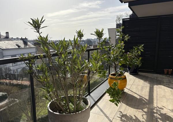Bel appartement T4 de 106.46 m² avec balcons et garage dans une résidence de standing récente au calme d'une impasse