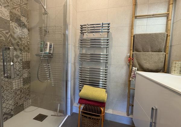 Bel appartement T4 de 106.46 m² avec balcons et garage dans une résidence de standing récente au calme d'une impasse