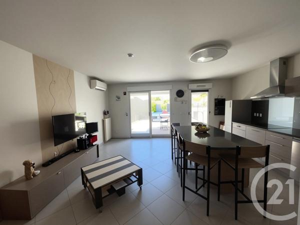 Appartement à vendre  3 pièces - 67 m 2   VENISSIEUX  - 69