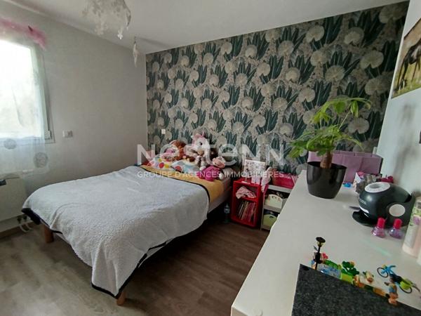 Maison familiale dans le bourg de Lauzach