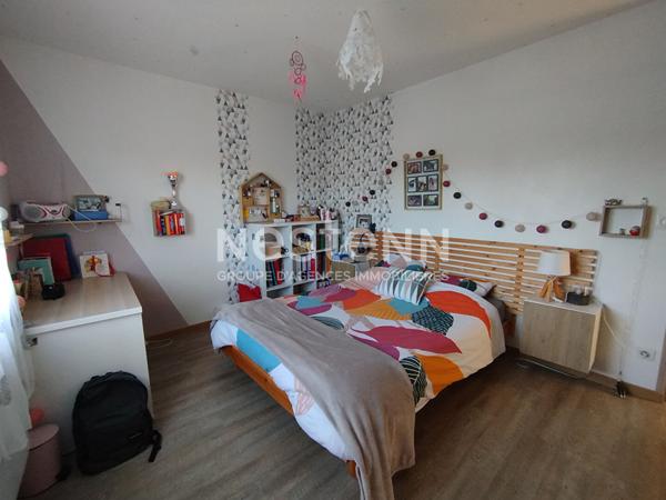 Maison familiale dans le bourg de Lauzach