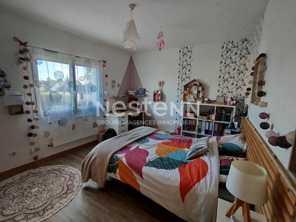 Maison familiale dans le bourg de Lauzach