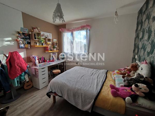 Maison familiale dans le bourg de Lauzach