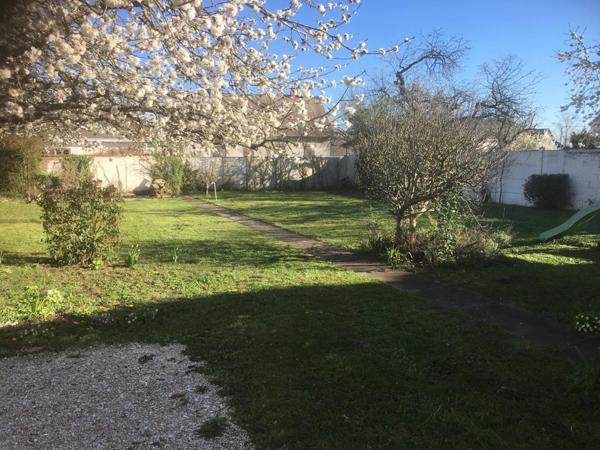 Maison bourgeoise avec jardin au centre ville