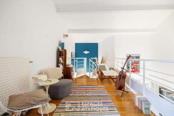 Double hauteur et terrasses en dernier étage à deux pas du Rhône