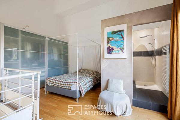 Double hauteur et terrasses en dernier étage à deux pas du Rhône