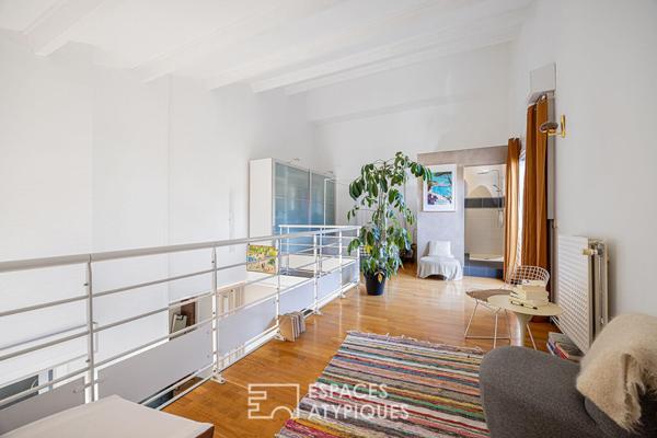 Double hauteur et terrasses en dernier étage à deux pas du Rhône