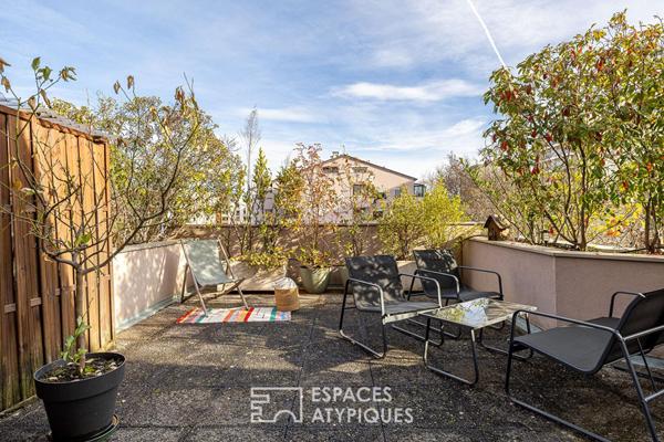 Double hauteur et terrasses en dernier étage à deux pas du Rhône