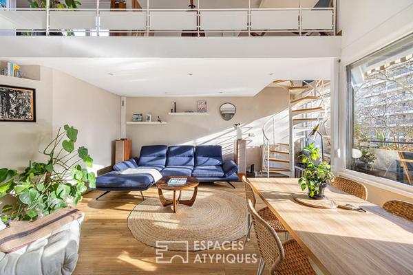 Double hauteur et terrasses en dernier étage à deux pas du Rhône