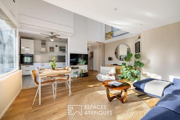 Double hauteur et terrasses en dernier étage à deux pas du Rhône