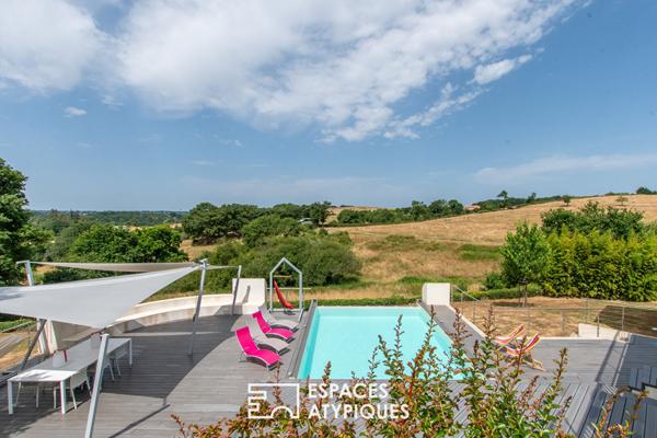 Maison avec piscine à débordement et vue sur la Vallée de la Sèvre
