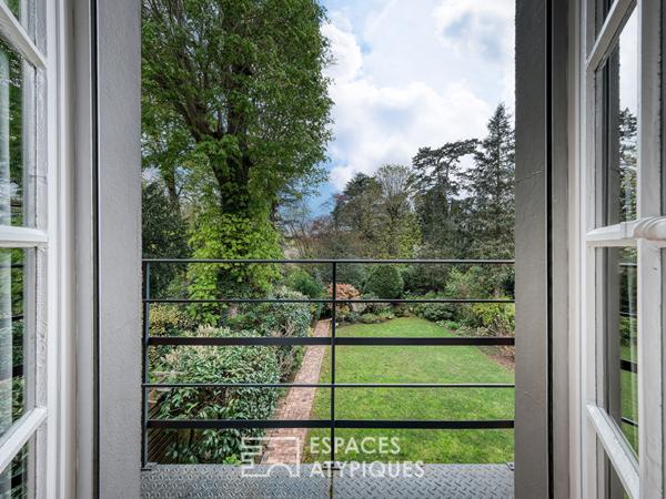 Maison meulière rénovée avec jardin et extensions dans un quartier recherché de Soisy-sur-Seine