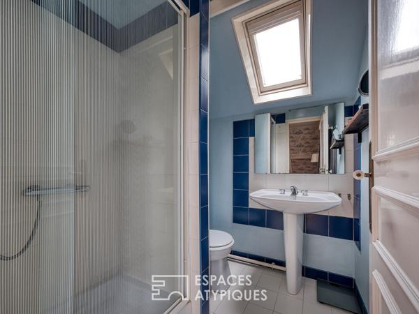 Maison meulière rénovée avec jardin et extensions dans un quartier recherché de Soisy-sur-Seine