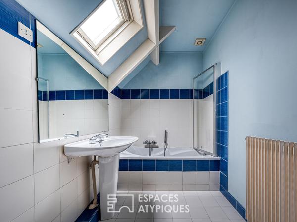 Maison meulière rénovée avec jardin et extensions dans un quartier recherché de Soisy-sur-Seine