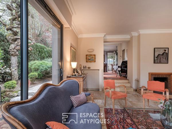 Maison meulière rénovée avec jardin et extensions dans un quartier recherché de Soisy-sur-Seine