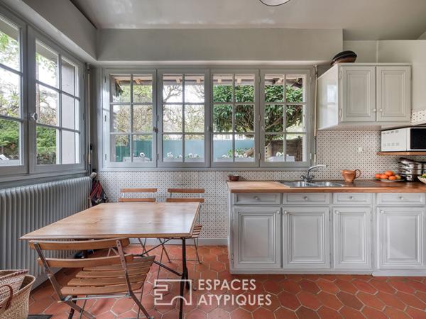 Maison meulière rénovée avec jardin et extensions dans un quartier recherché de Soisy-sur-Seine