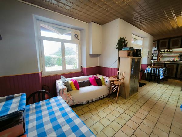 Grande maison de famille avec possibilité de commerce