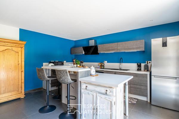 Appartement avec terrasse dans les dépendances d’une ancienne bâtisse