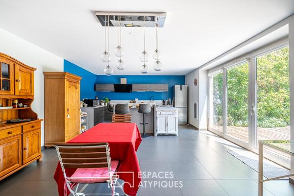 Appartement avec terrasse dans les dépendances d’une ancienne bâtisse