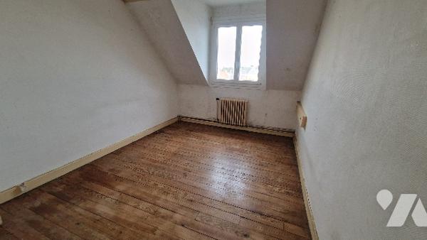 Immeuble à usage mixte commerce / habitation en centre-ville