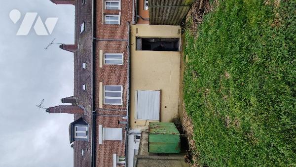 Immeuble à usage mixte commerce / habitation en centre-ville