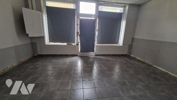 Immeuble à usage mixte commerce / habitation en centre-ville