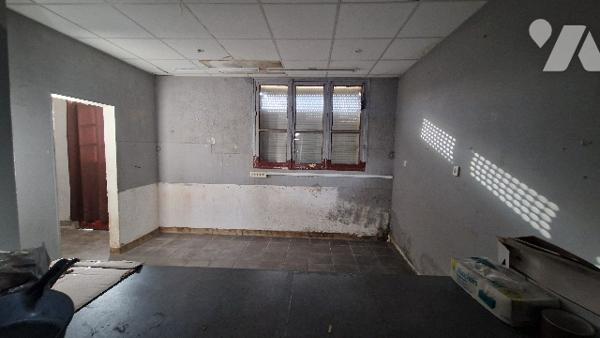 Immeuble à usage mixte commerce / habitation en centre-ville