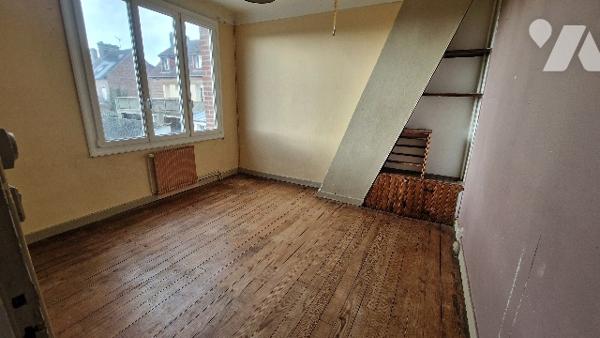 Immeuble à usage mixte commerce / habitation en centre-ville