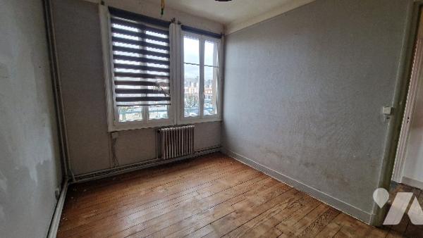 Immeuble à usage mixte commerce / habitation en centre-ville