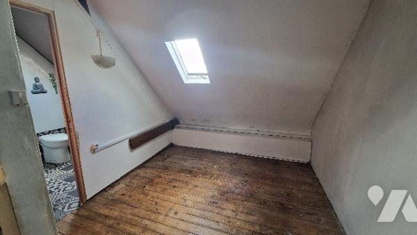 Immeuble à usage mixte commerce / habitation en centre-ville