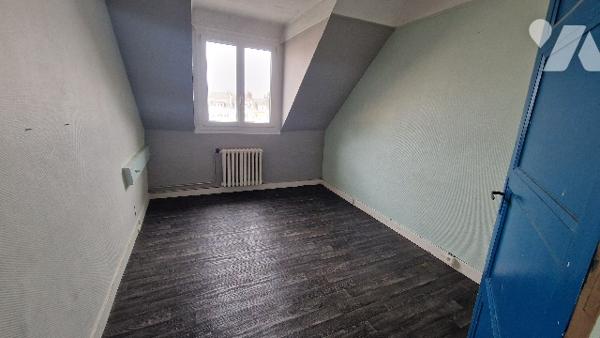 Immeuble à usage mixte commerce / habitation en centre-ville