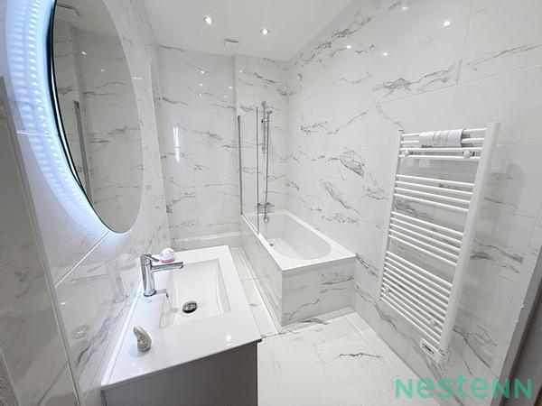 Un Écrin Contemporain sur l'une des plus belles places de Saint-Étienne