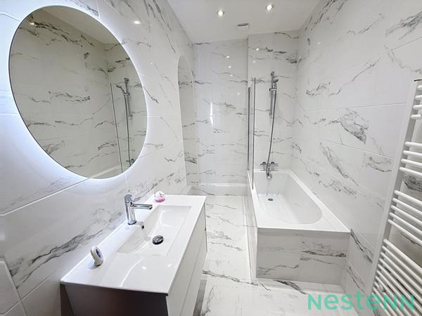 Un Écrin Contemporain sur l'une des plus belles places de Saint-Étienne