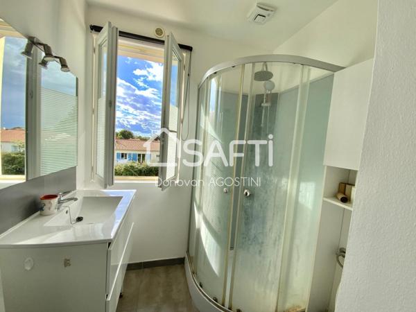 Maison de 119 m² avec 4 chambres, 2 salles de bain et une véranda