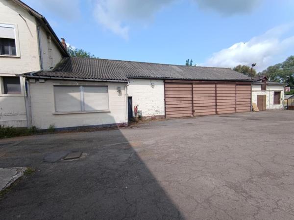 MAISON avec un ENSEMBLE IMMOBILIER IDEAL pour une ACTIVITE ARTISANALE OU LIBERALE