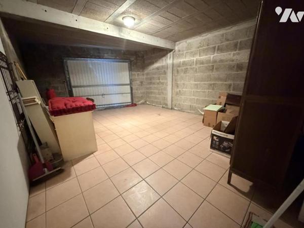 Appartement Type 3 avec 2 chambre , Terrasse avec jardin et un garage attenant fermé 