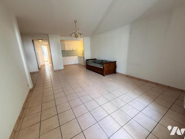 Appartement Type 3 avec 2 chambre , Terrasse avec jardin et un garage attenant fermé 